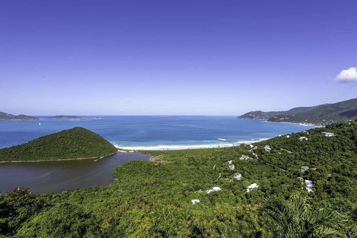 Breathtaking ocean and island views from a lush hillside retreat