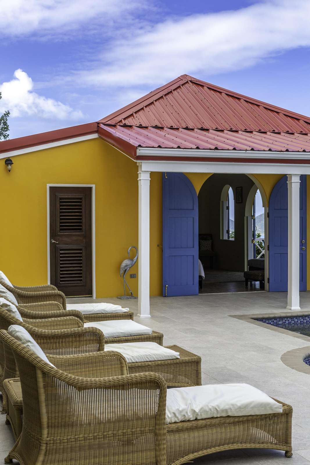 Sunny patio retreat with vibrant colors and cozy seating