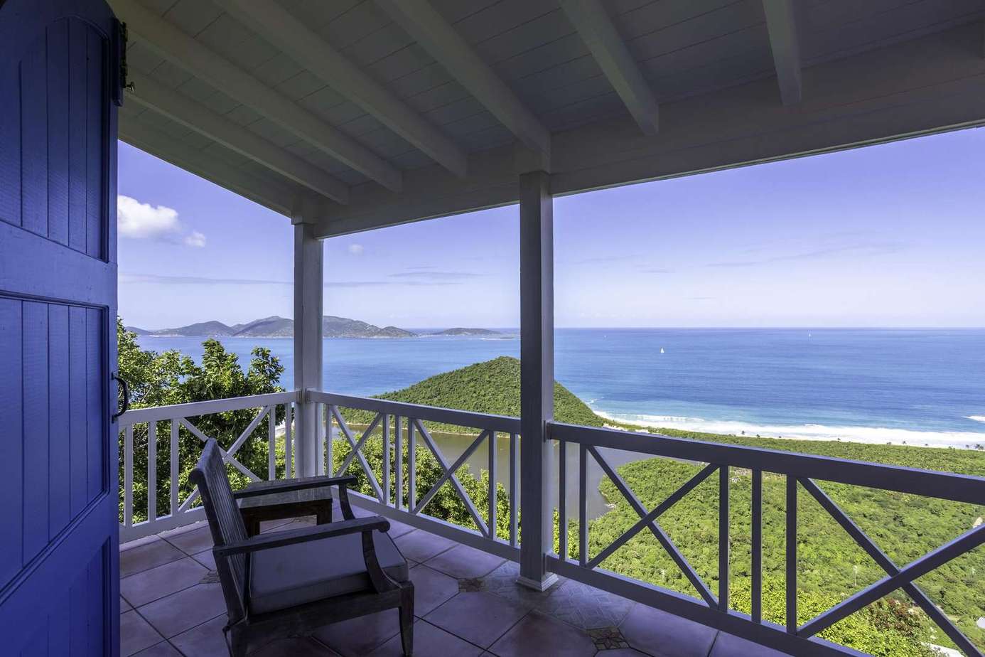 Oceanfront porch with panoramic beach and mountain views