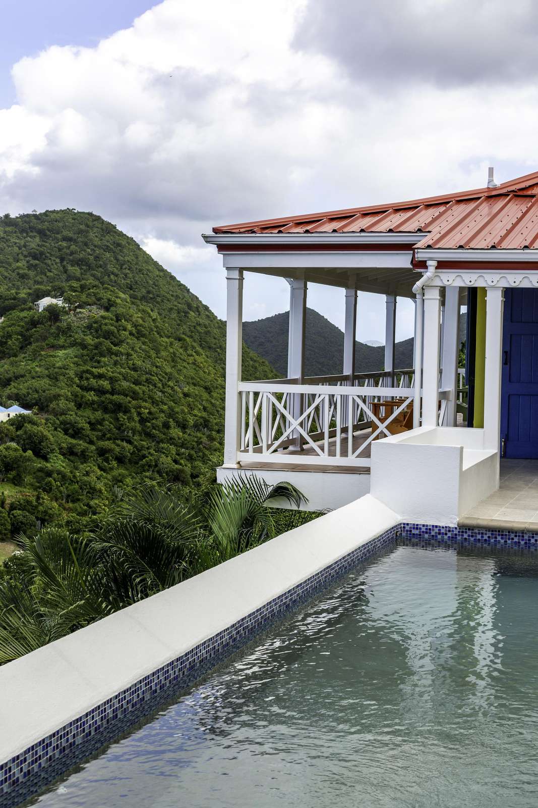 Private pool with stunning mountain views and cozy balcony seating