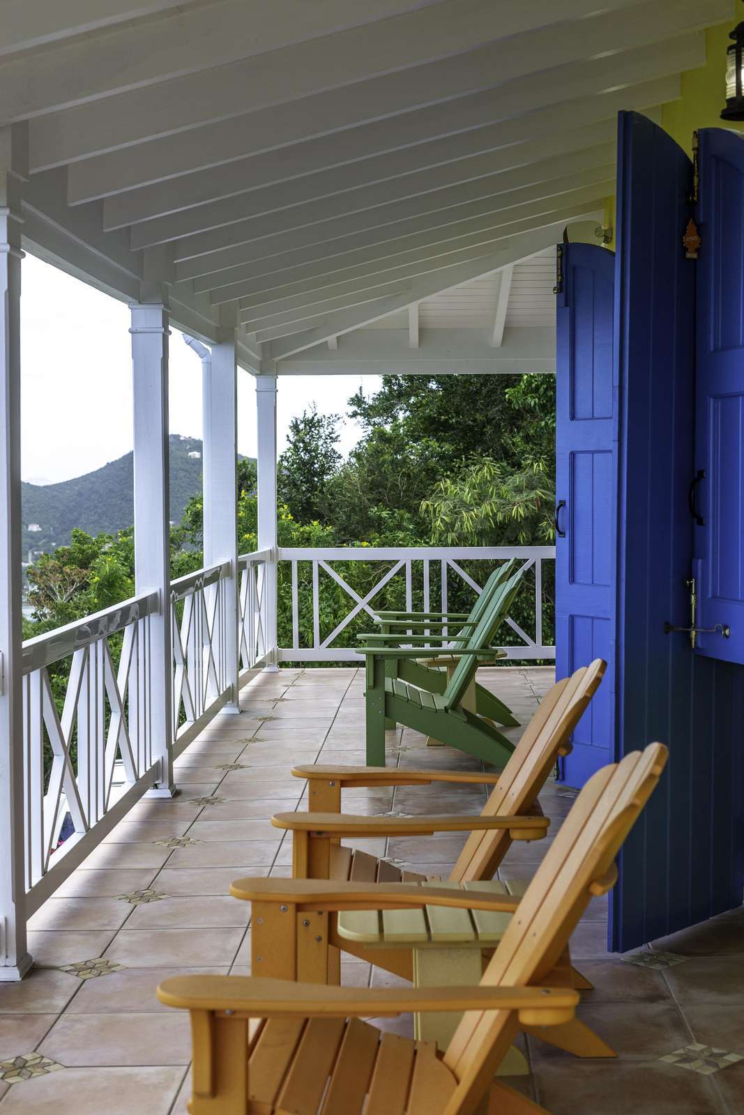 Cozy porch retreat with scenic mountain views and rocking chairs