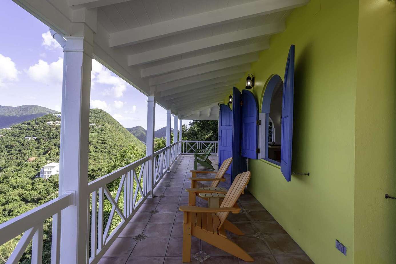 Relax on the spacious balcony with scenic mountain views