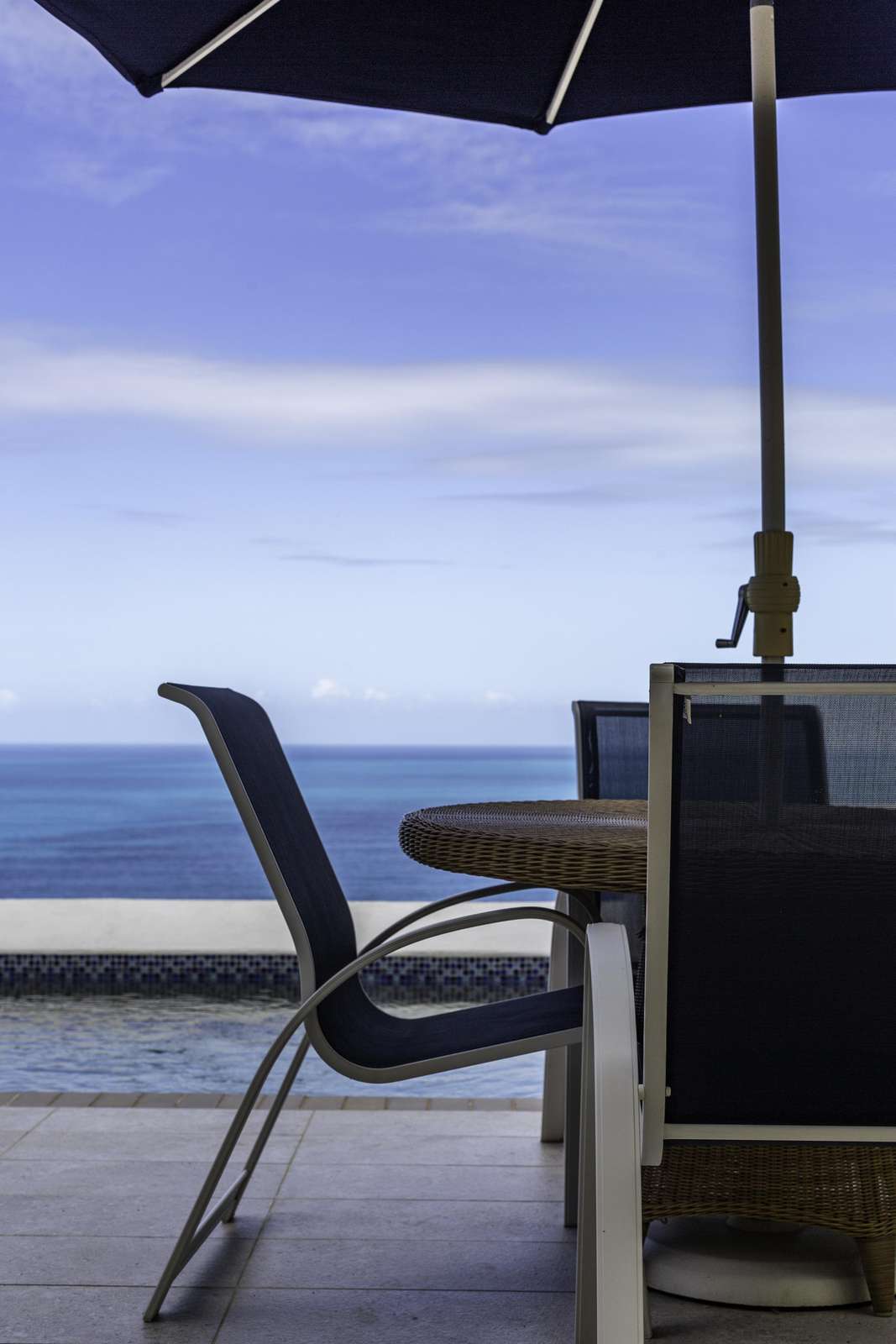 Oceanfront patio dining with stunning sea views