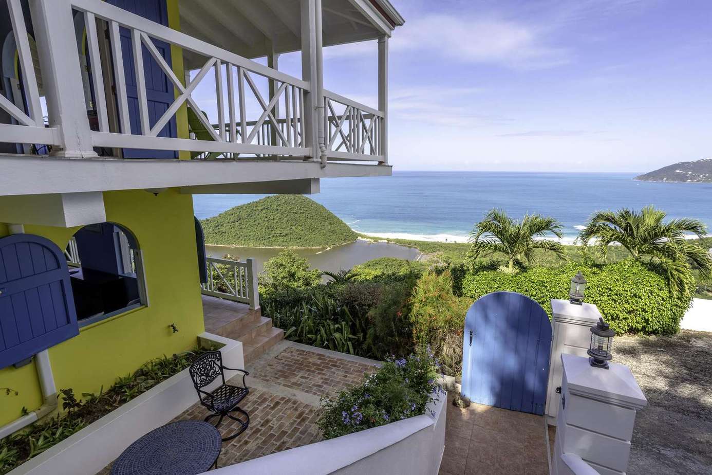 Ocean-view patio with vibrant colors and tropical charm