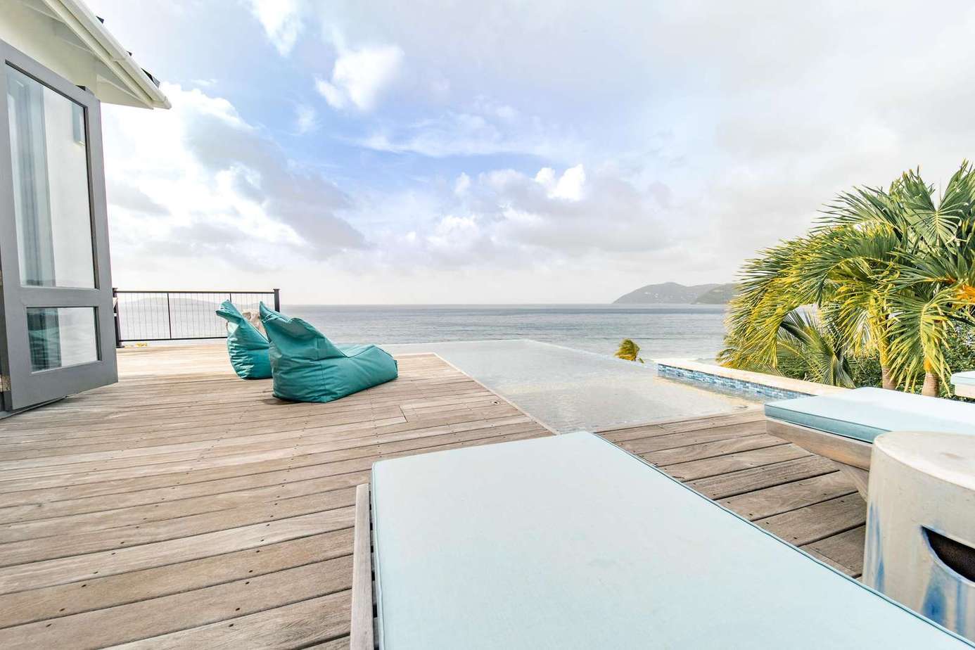 Long Bay beach is a mile long, and it's only a few yards from your pool. Stroll down the driveway and you're there.