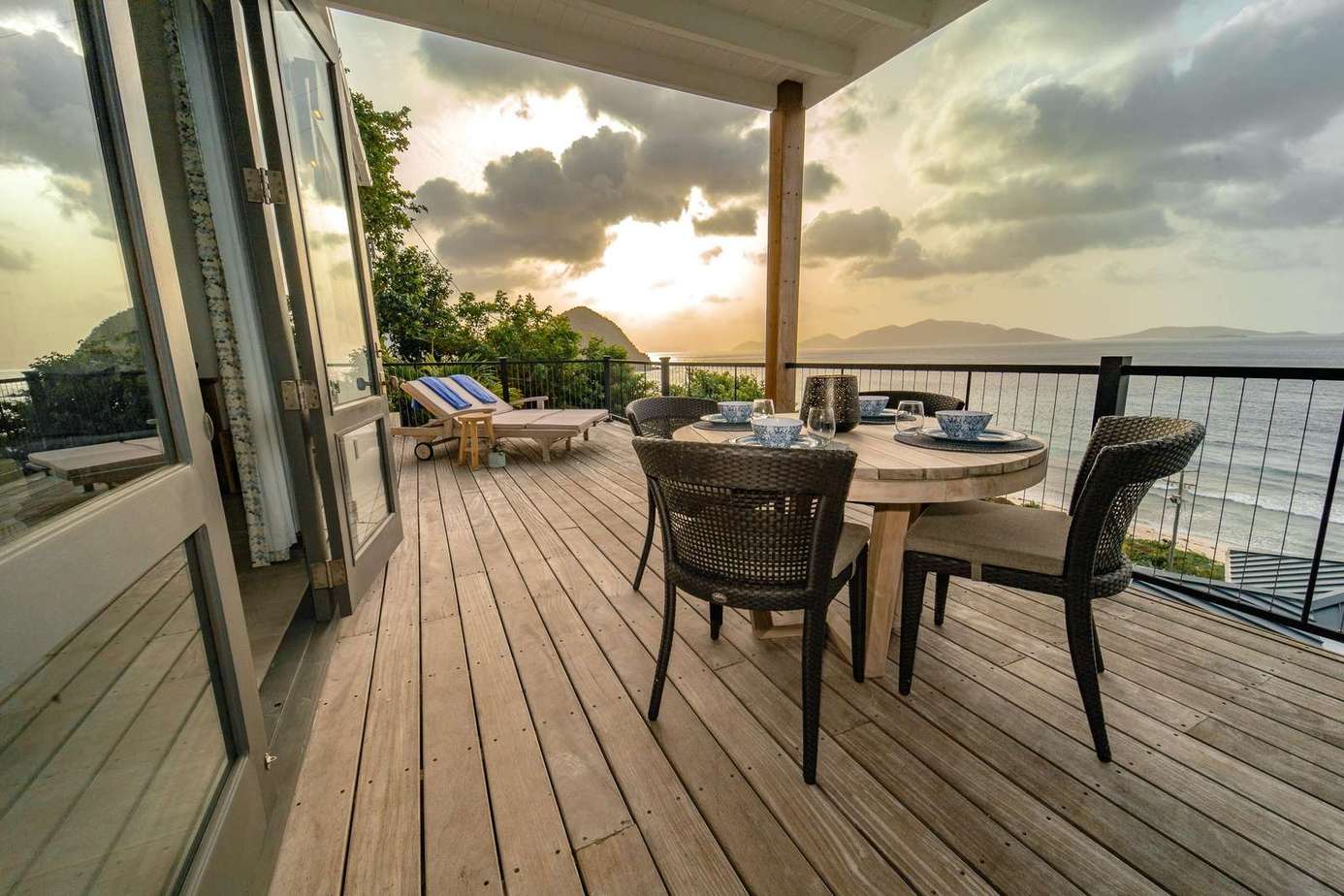 The Primary Suite has this magical private deck for peaceful moments and pretty beach views