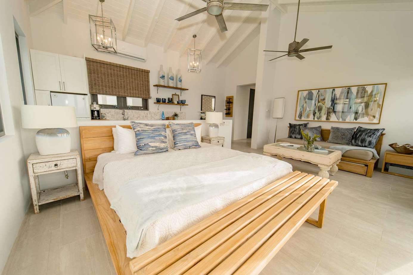 Primary Suite: a separate building just a few steps above the main house for complete privacy, with it's own large deck with dining and lounging furniture