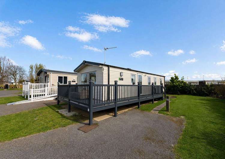 50016KC⛱️- Kestrel Court, 3 bed, 8 berth caravan with wrap-around decking, D/G & C/H. Diamond rated. Preview 0