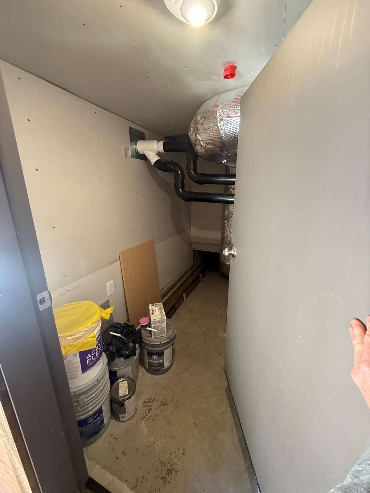 Cozy storage nook with convenient bike rack and shelving - property