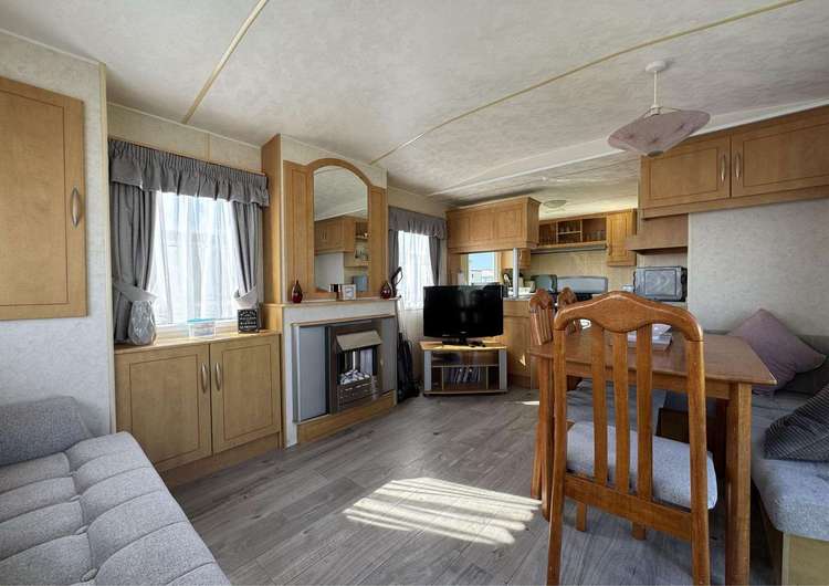 67052L⭐ – L area, 3 bed, 6 berth caravan with decking to the side. Emerald rated. Preview 5