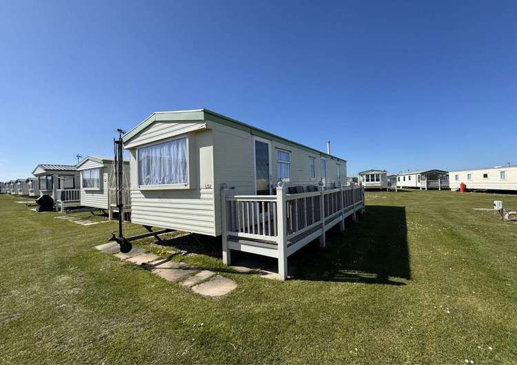 67052L⭐ – L area, 3 bed, 6 berth caravan with decking to the side. Emerald rated. Preview 0