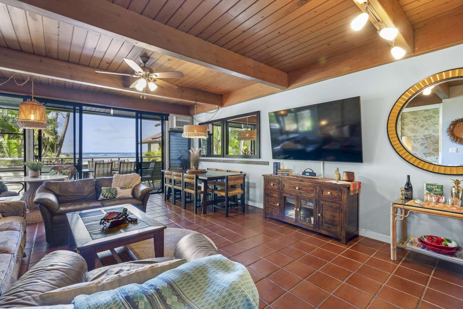 Spacious living room with cozy seating and scenic views - property