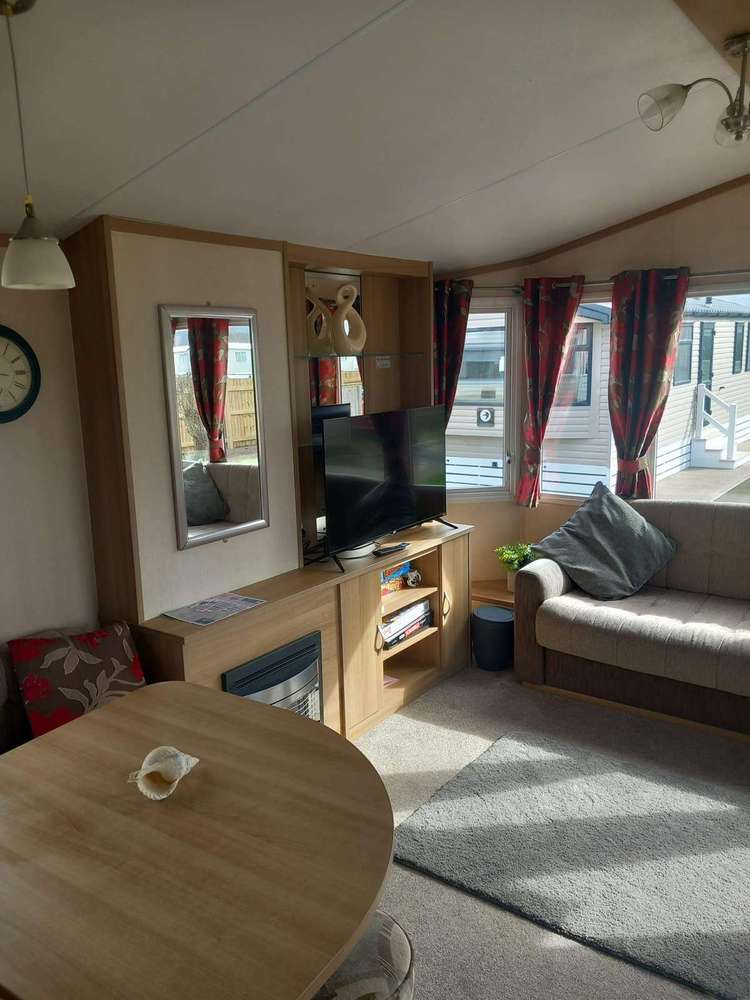 86020D⭐ – Row D, 3 bed 8 berth caravan with central heating and double glazing. Ruby rated. Preview 0