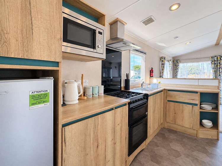 28014PM⭐ – Priory Meadow, 2 bed, 6 berth caravan with D/G and C/H. Ruby rated. Preview 3