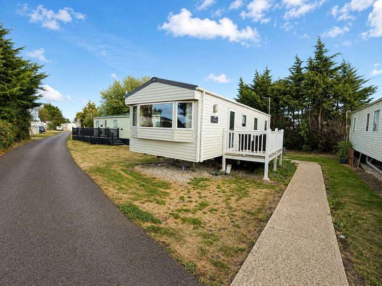 36010C⭐ – C, 3 bed, 7 berth caravan with decking to the side. Ruby rated. Preview 0