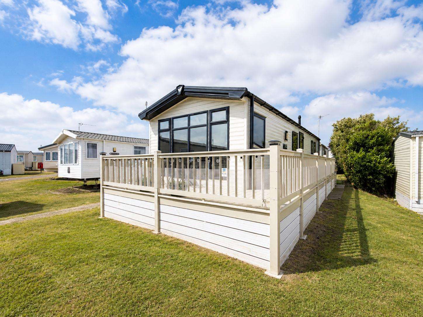 Imagine relaxing in the living area of a caravan after a fun-filled day exploring the sandy Suffolk beaches or strolling through the picturesque streets of Lowestoft Town. - property