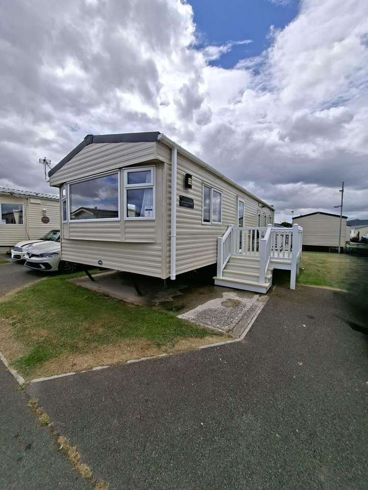 86003V⭐ – Row V, 3 bed 7 berth caravan with decking, C/H, and D/G. Opal rated. Preview 0
