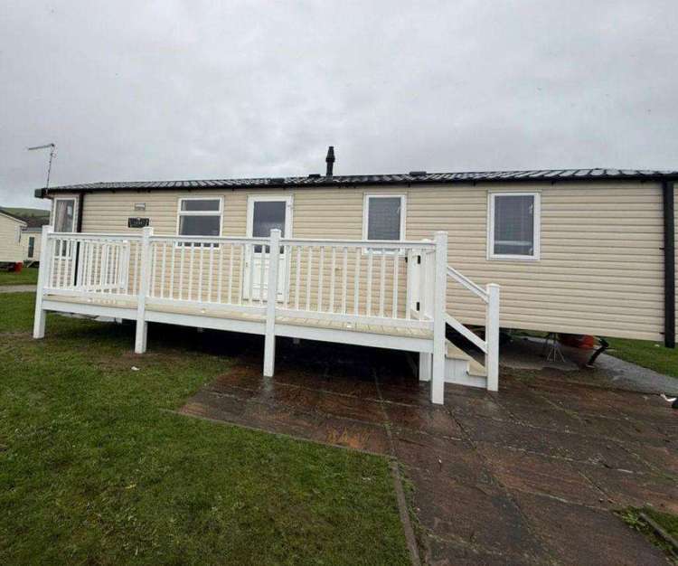 57017SI⭐ – St Ishmaels Park, 2 bed 6 berth caravan with decking, C/H, and D/G. Opal rated. Preview 0