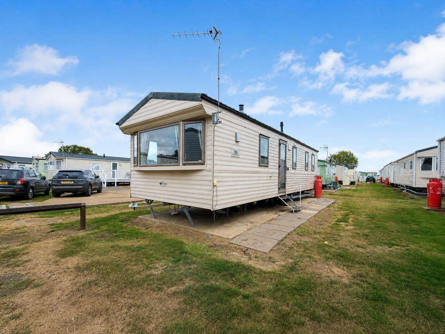 Enjoy a relaxing caravan holiday at St Osyth Beach Holiday Park near Clacton-on-Sea, Essex, staying in our spacious 3-bedroom, 8-berth caravan, perfect for families and couples looking for an affordable UK seaside staycation. - property