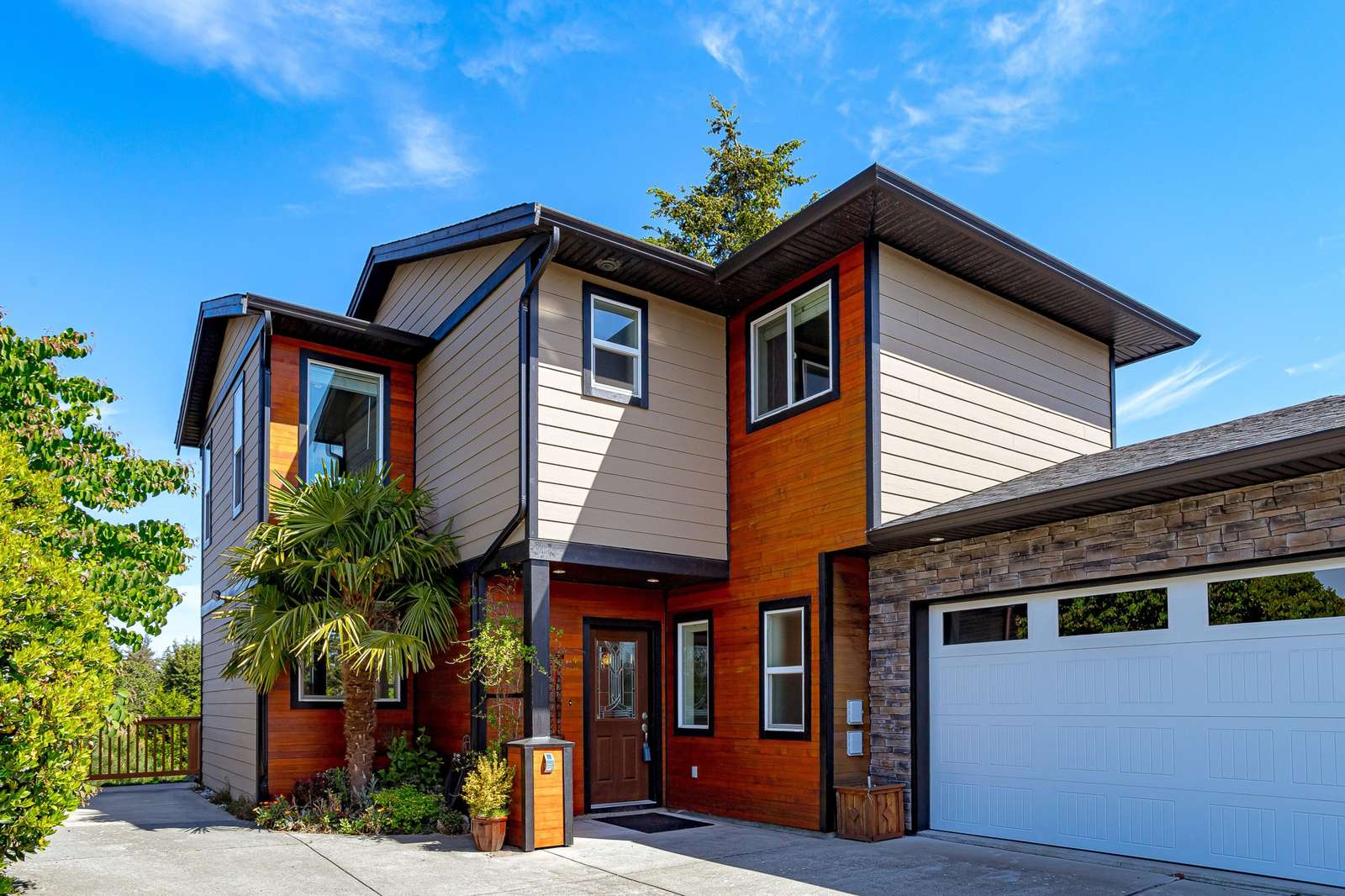 Welcome home to The Cornerstone, featuring an attached single-car garage and a wide front driveway in a peaceful Langford setting. - property