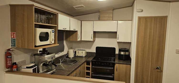 86006W⭐ – Row W, 3 bed 8 berth caravan with scenic mountain views. Ruby rated. Preview 5