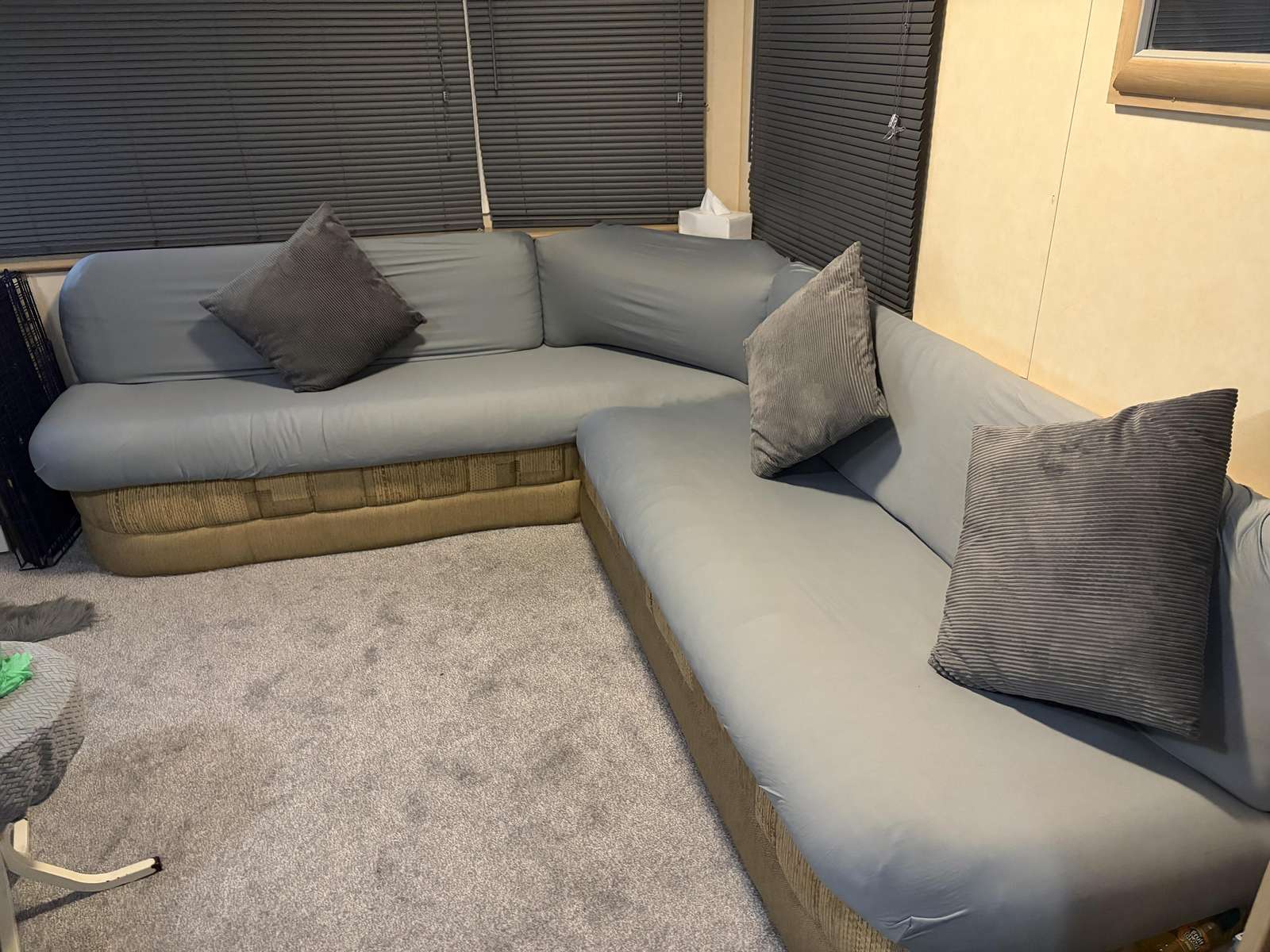 Spacious caravan lounge with comfortable seating at Highfield Grange, perfect for a relaxing UK caravan holiday. - property