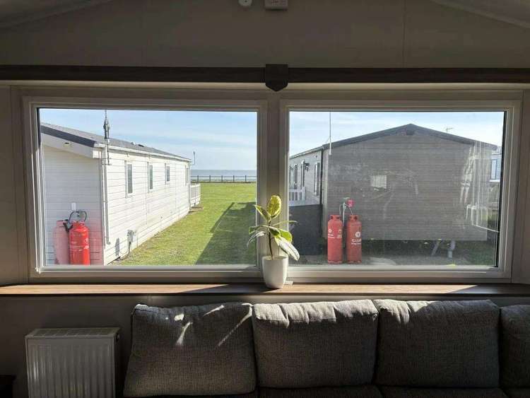 20107BS⭐ – Broadlands, 2 bed, 4 berth caravan with a partial sea view, D/G and C/H. Ruby rated. Preview 1