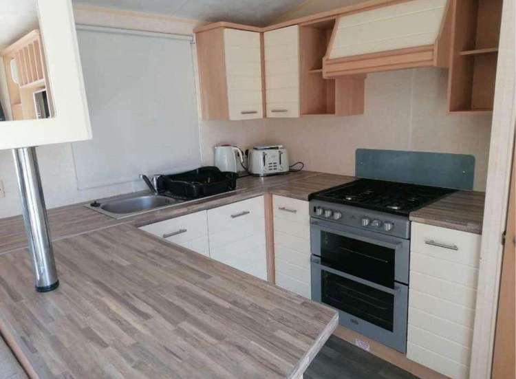 33056S⭐ – Springs, 3 bed, 8 berth caravan with side decking, D/G & C/H. Ruby rated. Preview 1