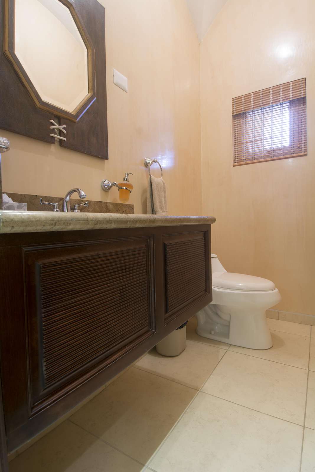 Guest half bathroom off the living room/lobby area