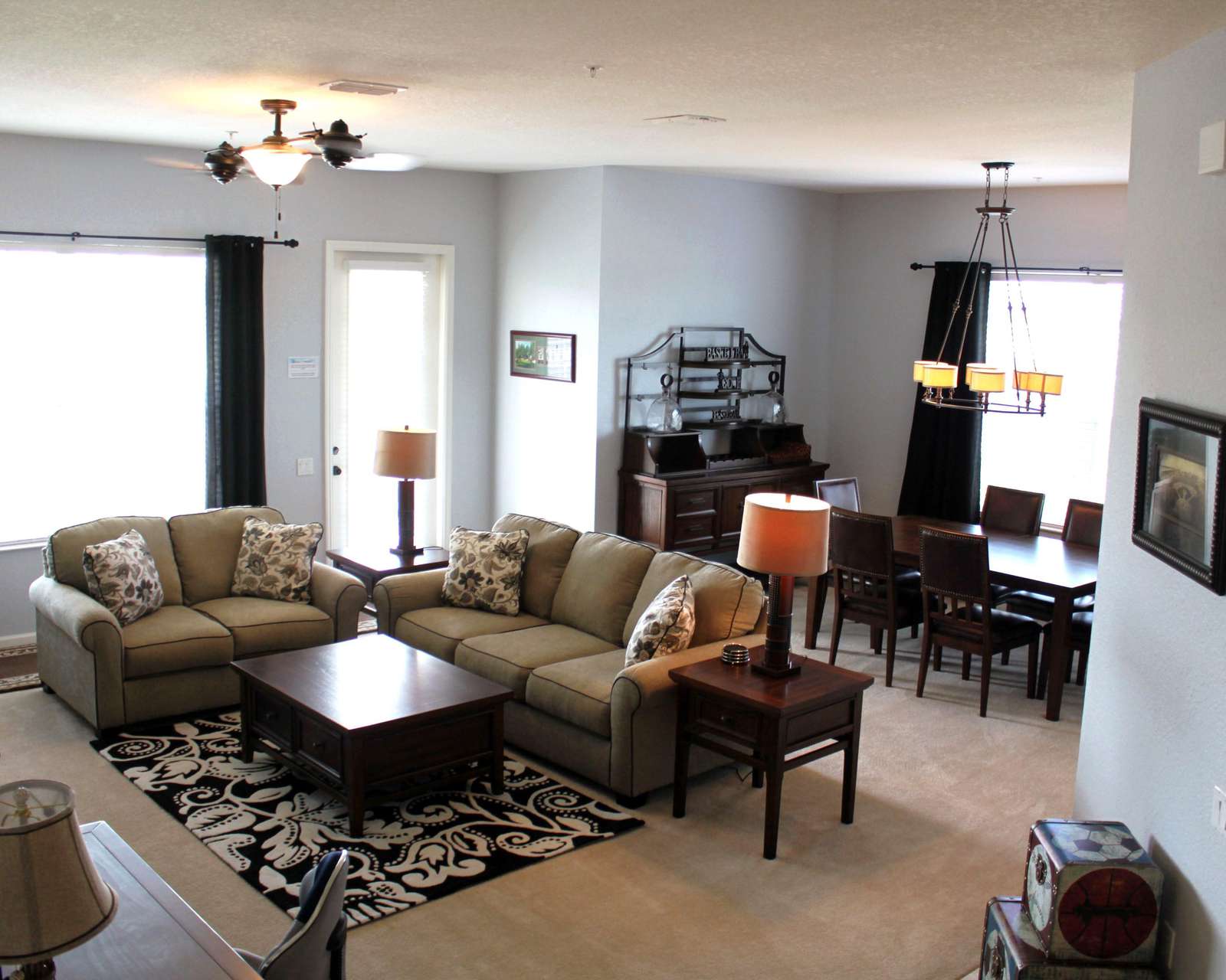 Another view of living room with dining room in background