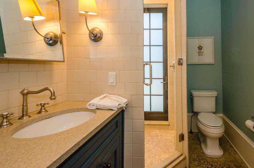 1st Floor Full Bathroom: Private Entrance from Pool Area Directly into an Indoor Shower