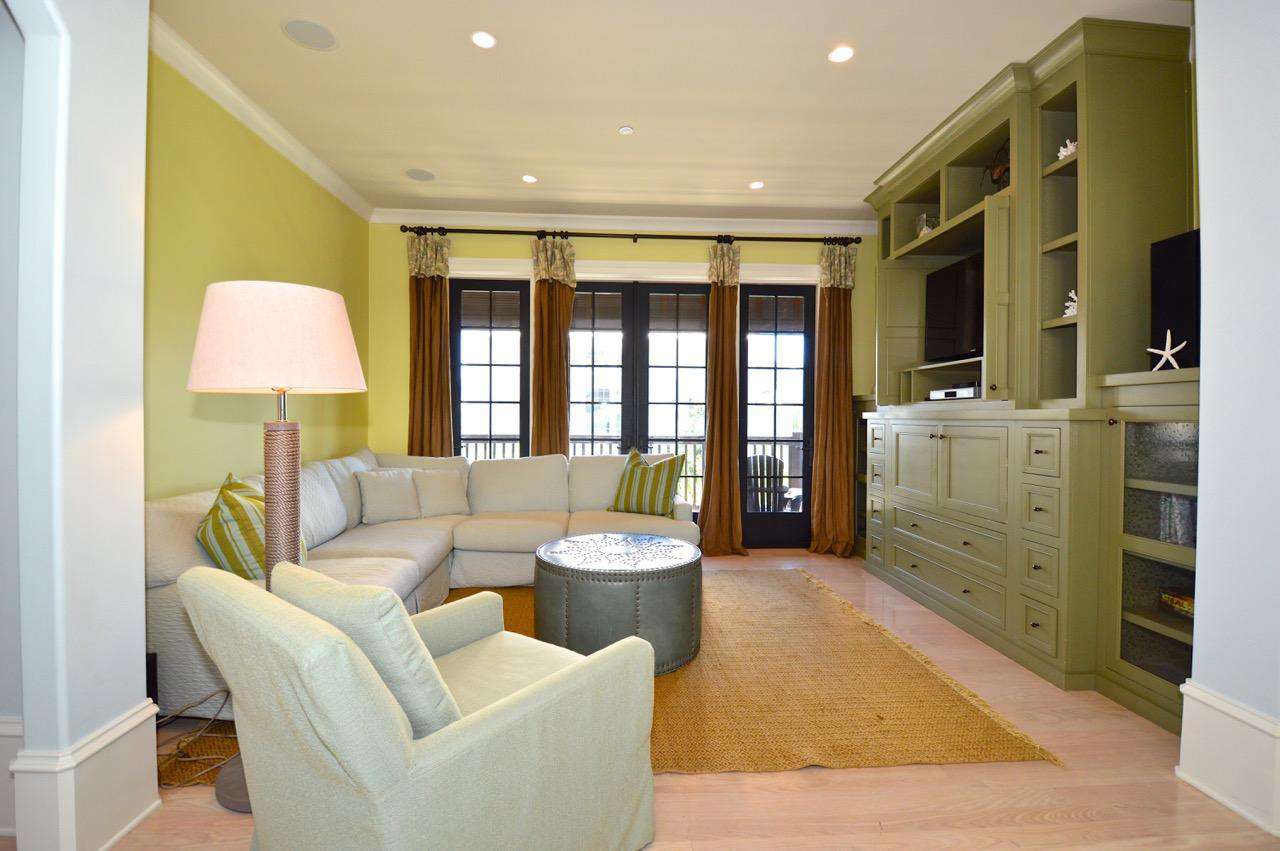 2nd Floor Entertainment/Lounge Area: Spacious and Comfortable Entertainment Area with TV and Access to Covered Balcony