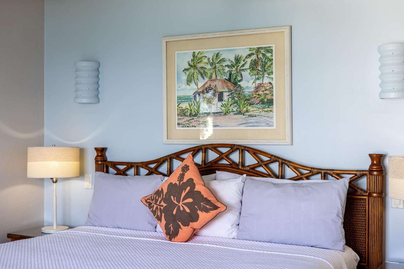 Cozy bedroom retreat with elegant wooden headboard and soft lighting