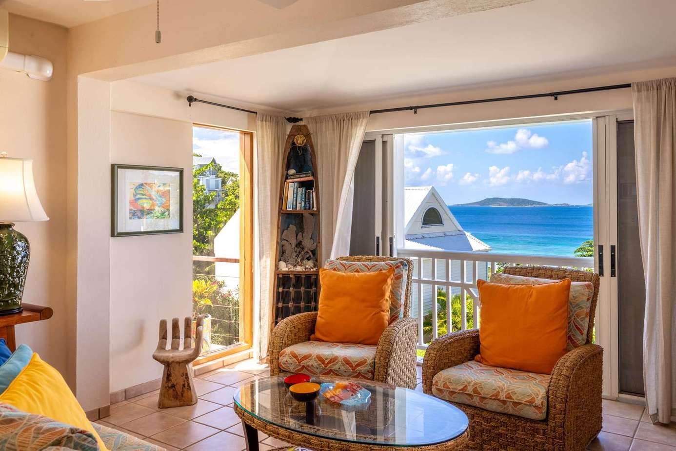Cozy living room with stunning ocean and island views