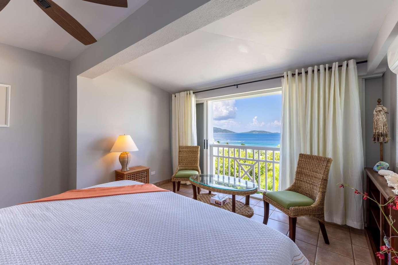 Cozy bedroom with stunning ocean views and natural light