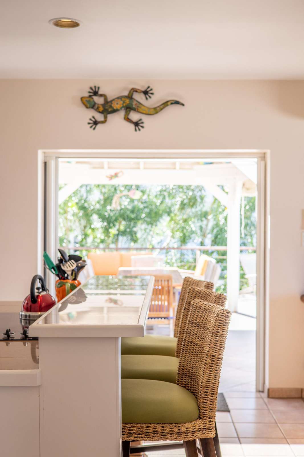 Bright breakfast nook with garden views and cozy seating