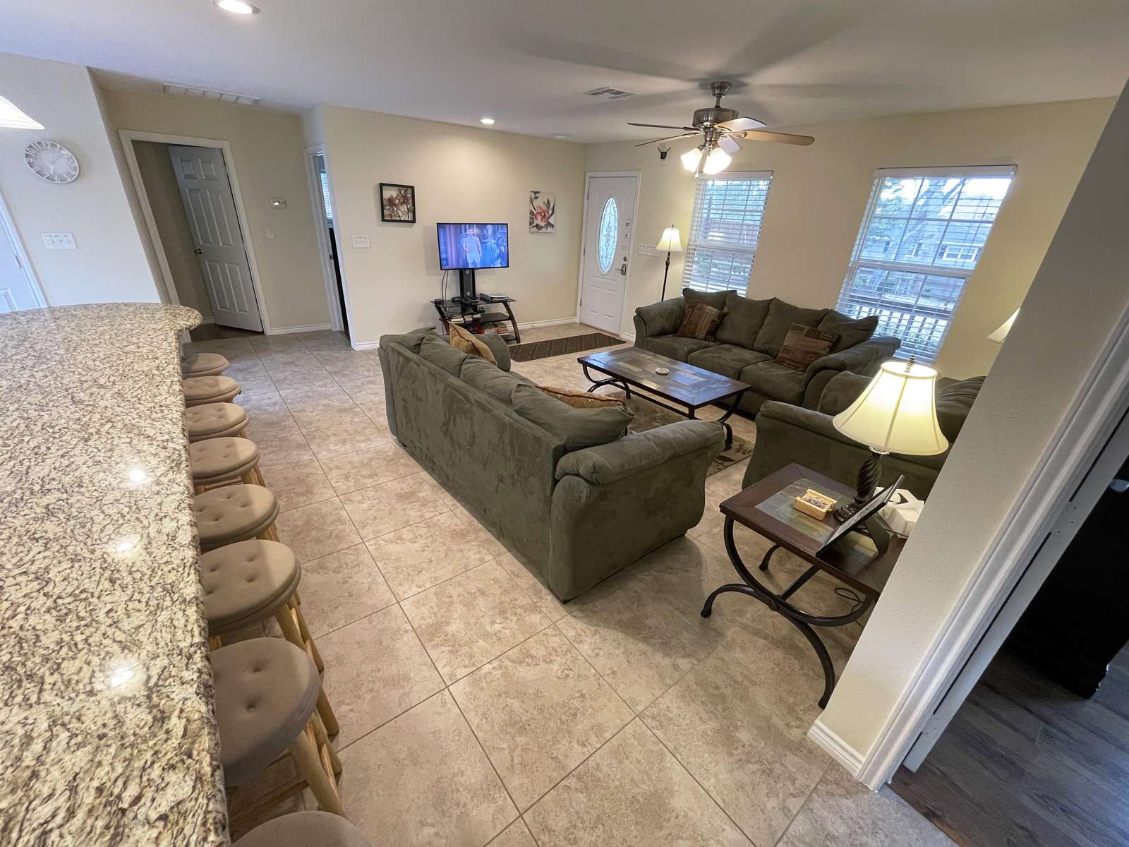 Looking towards the television which has a Roku with Netflix and cable.