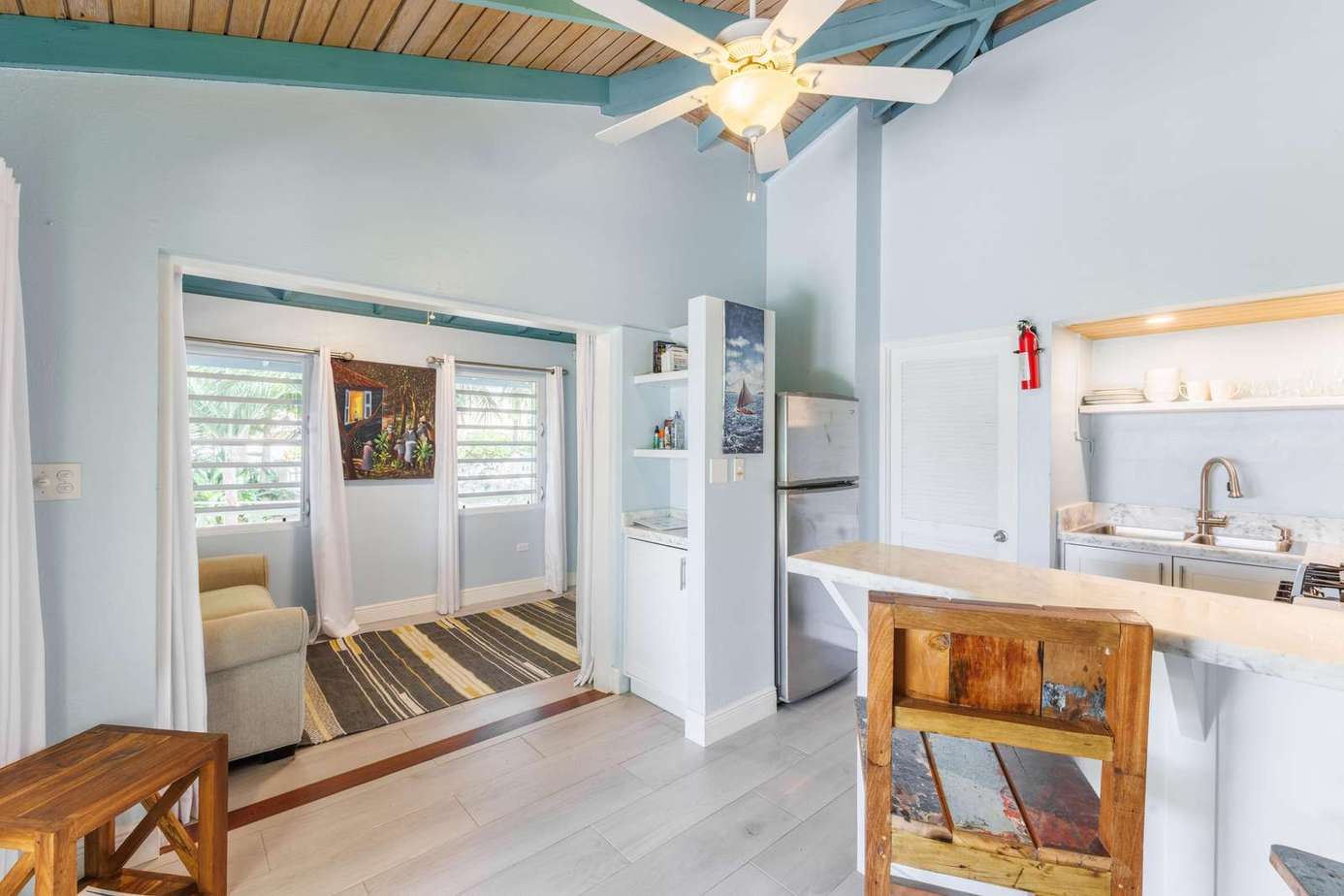 Bright, airy kitchen and cozy adjoining living area perfect for relaxing gatherings