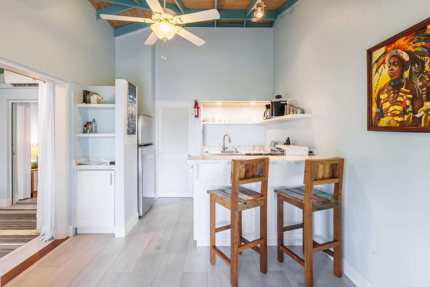 Bright and airy kitchen with cozy breakfast bar seating
