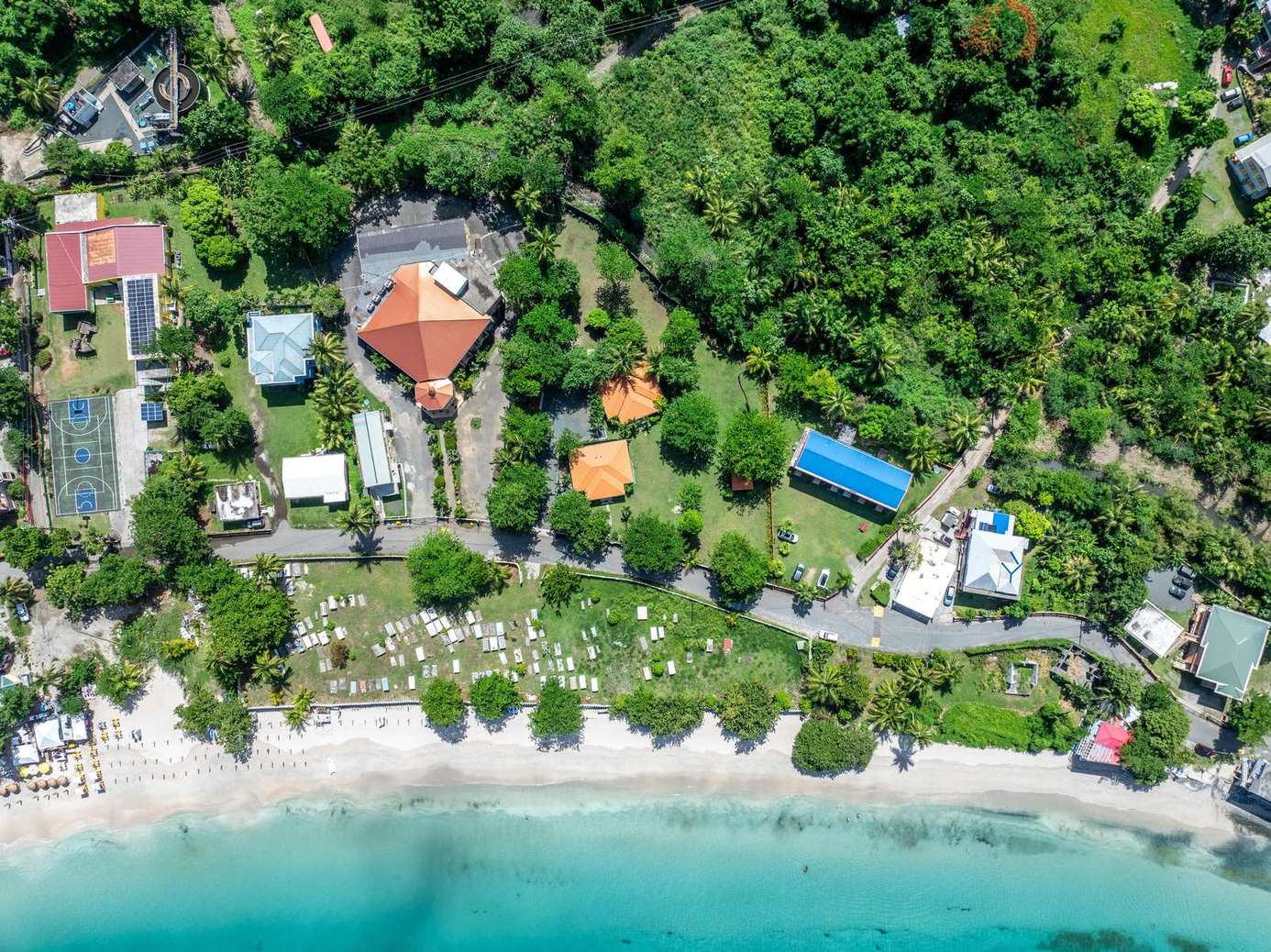 Secluded beachfront escape with lush tropical surroundings