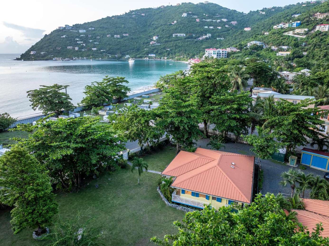 Secluded cottage with lush garden and ocean views