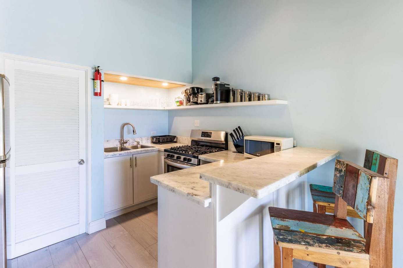 Bright, modern kitchen with cozy breakfast bar seating