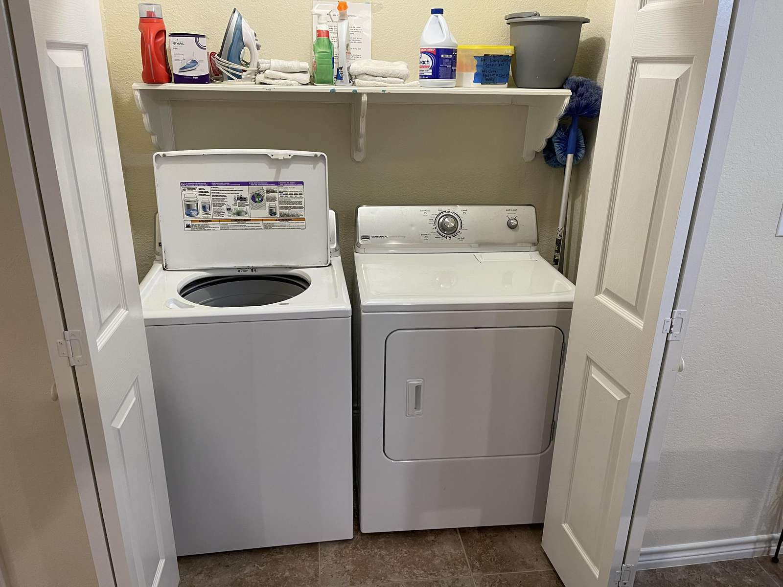 The laundry area is located off the entry foyer.