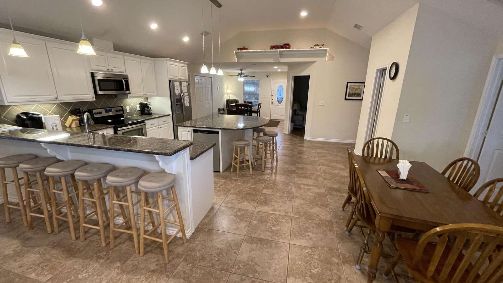 Our guests love the open concept. The main living areas extend about 50'.