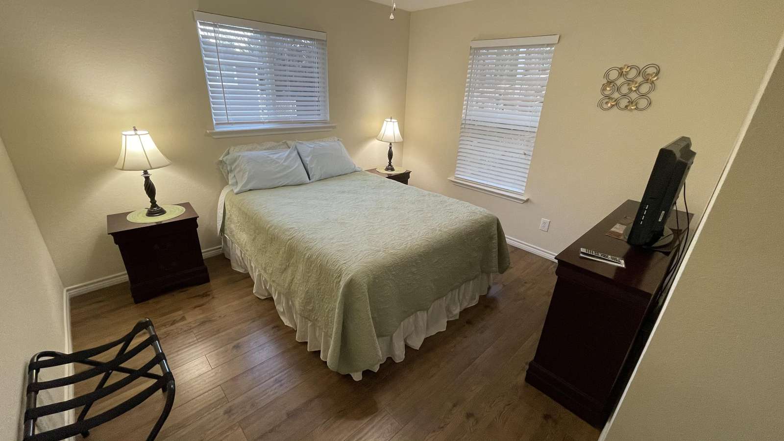 The bright and cheery Queen Bedroom #1