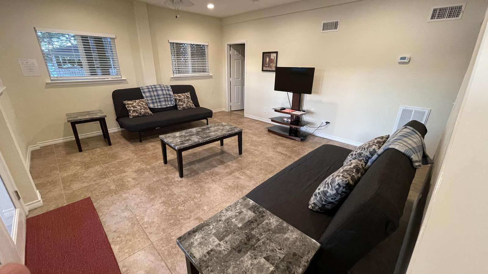 While we call this the gameroom (Kids seem to gravitate to this downstairs room.) it could be considered a 6th bedroom. It has its own full bath with tub/shower.