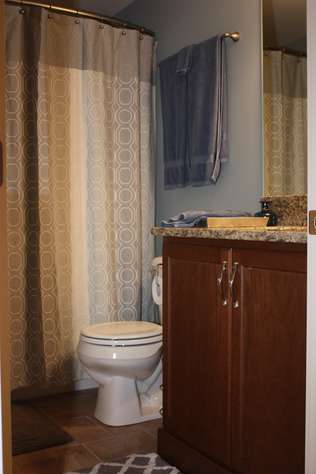 Lower level bath with washer and dryer