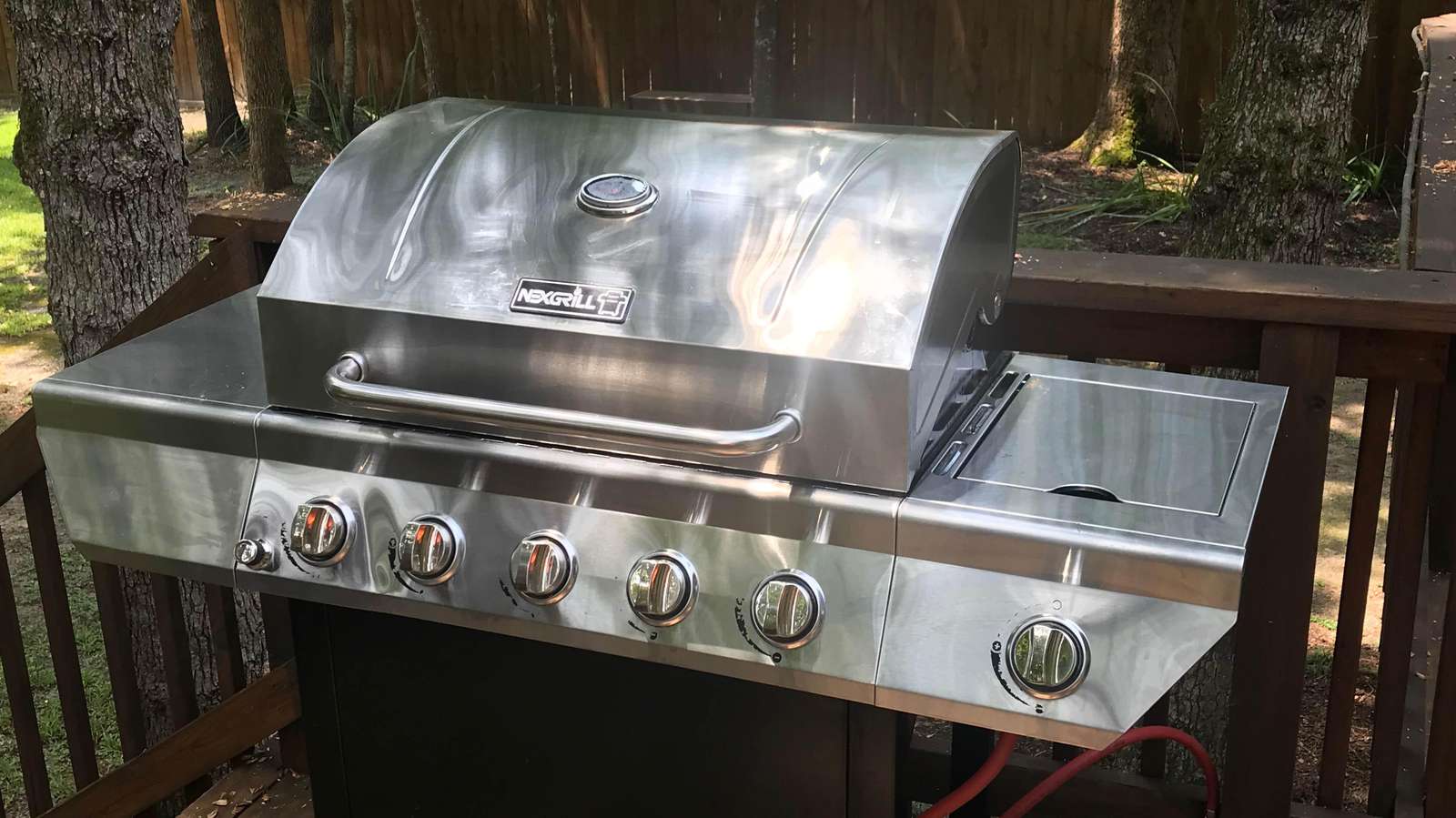 We've added a gas grill. We left the Weber for those that prefer the charcoal grilling.