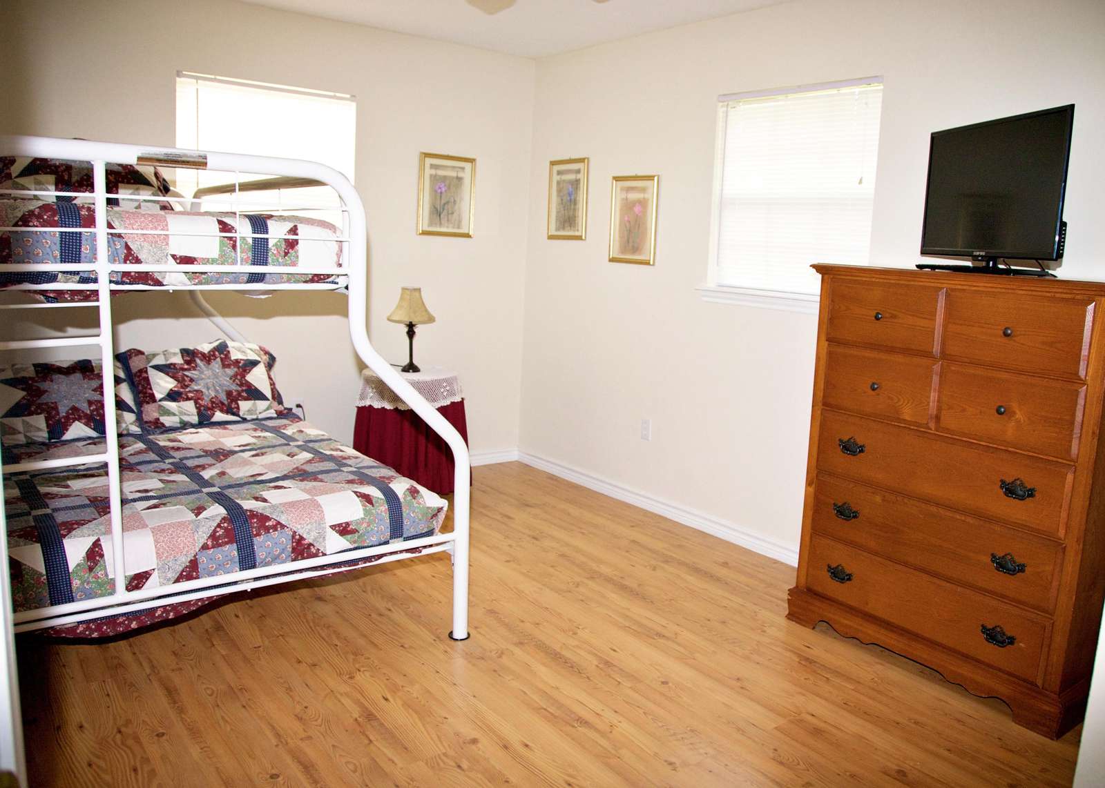 The third bedroom is a twin over full bunk with a flat screen television and basic cable.