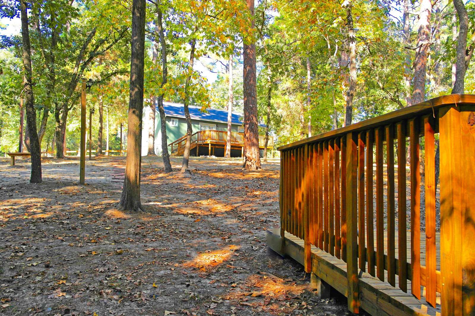 Looking from the fern deck to the home. This path is lighted at night time and controlled by a switch in the home.